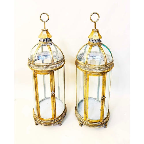 343 - LANTERNS, a pair, Regency style gilt metal and glass, 80cm H x 22cm W x 22cm D. (2)