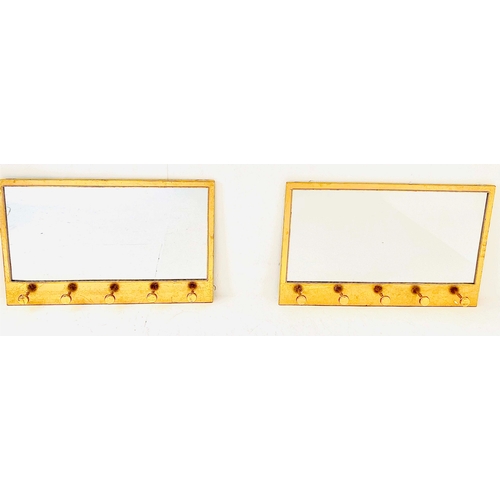 346 - WALL MIRRORS, a pair, gilt metal frames with hanging pegs, 66cm H x 41cm. (2)