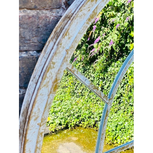 349 - ARCHITECTURAL GARDEN MIRRORS, a set of three, arched metal frames, 160cm H x 67cm W. (3)