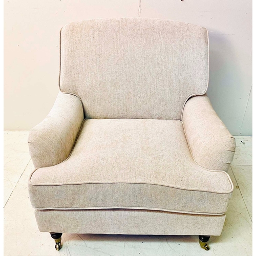 359 - ARMCHAIR, Howard style with light grey upholstery on turned supports, 80cm H x 75cm W x 85cm D.