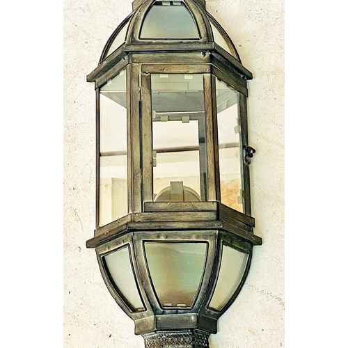 360 - WALL LANTERNS, a set of three, mirrored backs and distressed metal, 71cm H x 22cm W. (3)