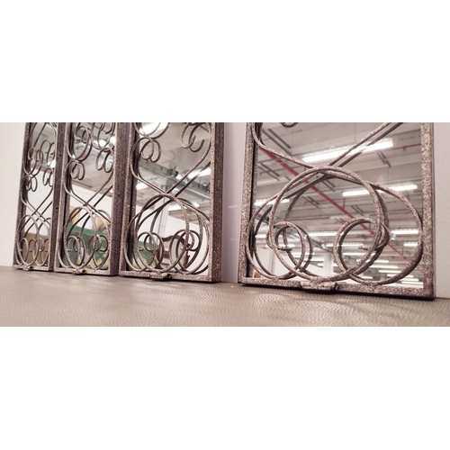 363 - ARCHITECTURAL GARDEN MIRRORS, a set of four, metal arched frames with plant pot holders, 58cm H x 28... 