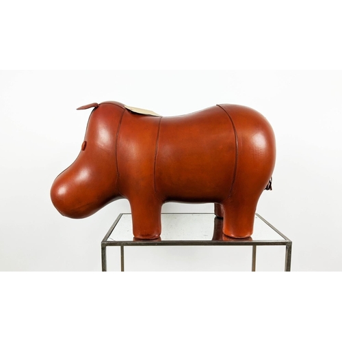 364 - HIPPO FOOTSTOOL, tan leathered, 30cm H x 53cm L.