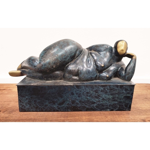 375 - CONTEMPORARY SCHOOL SCULPTURE, of a reclining nude female in and blue and gilt finish, 17cm H x 28cm... 