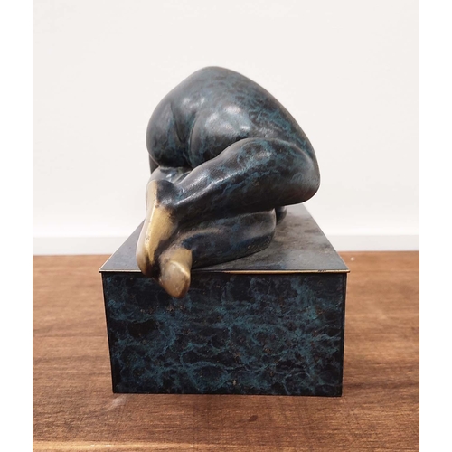 375 - CONTEMPORARY SCHOOL SCULPTURE, of a reclining nude female in and blue and gilt finish, 17cm H x 28cm... 