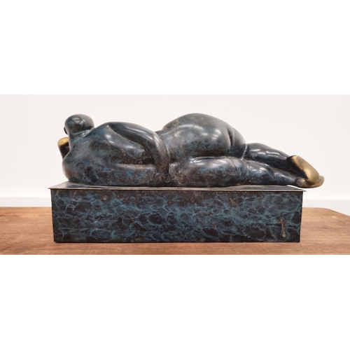 375 - CONTEMPORARY SCHOOL SCULPTURE, of a reclining nude female in and blue and gilt finish, 17cm H x 28cm... 