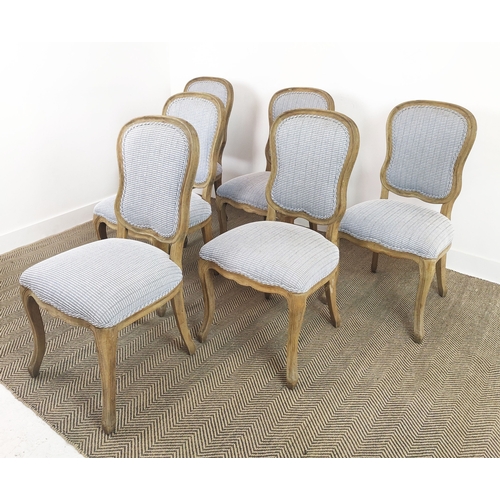 383 - DINING CHAIRS, a set of six in a blue and white patterned fabric with wooden show frames. (6)