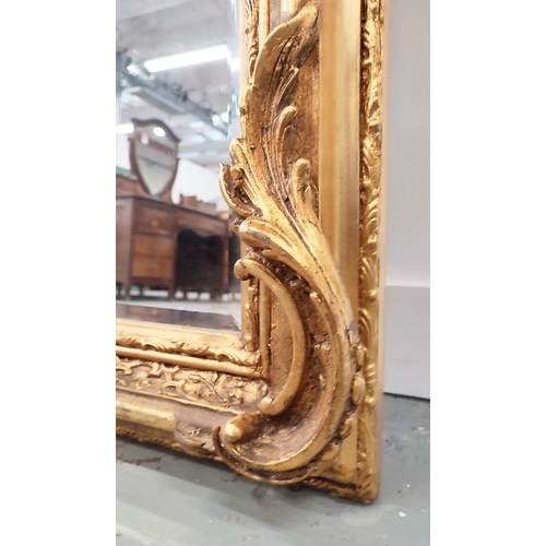 388 - OVERMANTEL MIRROR, gilt frame with ornate crest, 155cm H x 86cm W.