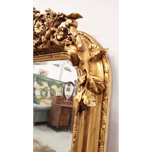 388 - OVERMANTEL MIRROR, gilt frame with ornate crest, 155cm H x 86cm W.