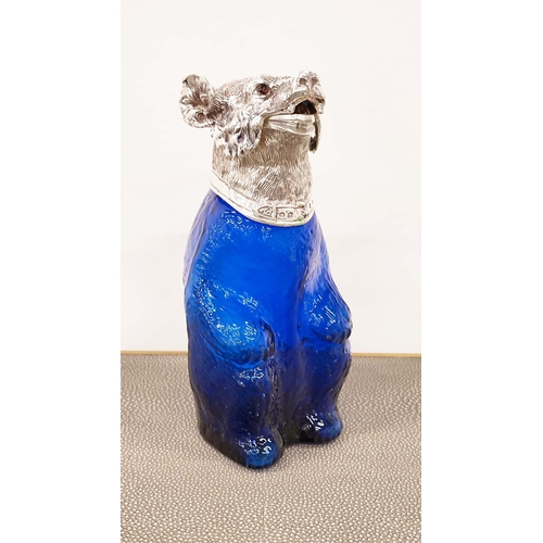 395 - CLARET JUG, bear form with blue glass body and polished metal head, 24cm H.