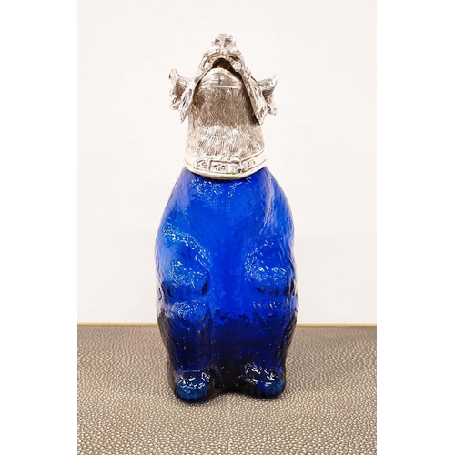 395 - CLARET JUG, bear form with blue glass body and polished metal head, 24cm H.