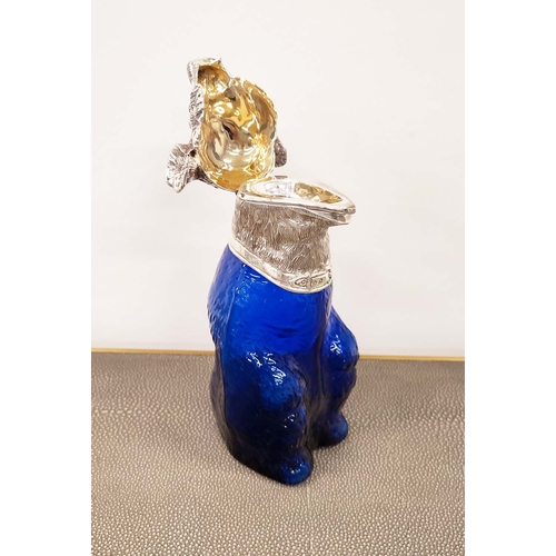 395 - CLARET JUG, bear form with blue glass body and polished metal head, 24cm H.