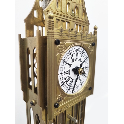 402 - ELIZABETH TOWER SKELETON CLOCK, gilt metal and glass cased, 70cm H x 21cm W x 16cm D.