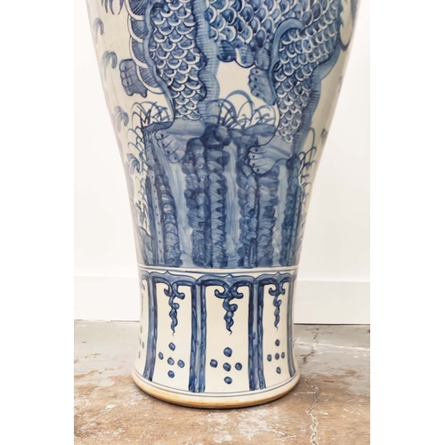 403 - TEMPLE JARS, a pair, Chinese style blue and white ceramic, 110cm H x 42cm W. (2)