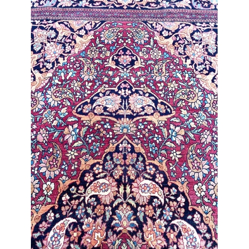 51 - ANTIQUE PERSIAN ISFAHAN RUG, 230cm x 140cm.