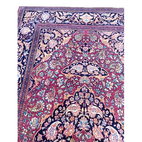 51 - ANTIQUE PERSIAN ISFAHAN RUG, 230cm x 140cm.