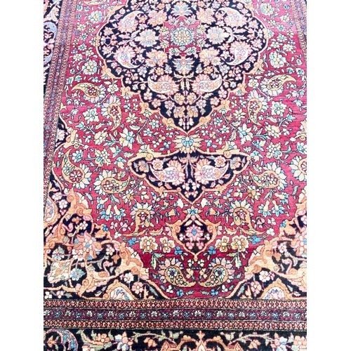 51 - ANTIQUE PERSIAN ISFAHAN RUG, 230cm x 140cm.