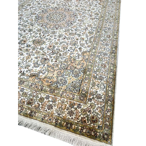 55 - FINE PURE SILK HEREKE DESIGN CARPET, 273cm x 170cm.