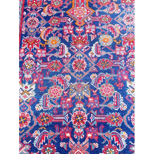 57 - ANTIQUE NORTH WEST PERSIAN FEREGHAN RUNNER, 490cm x 109cm.