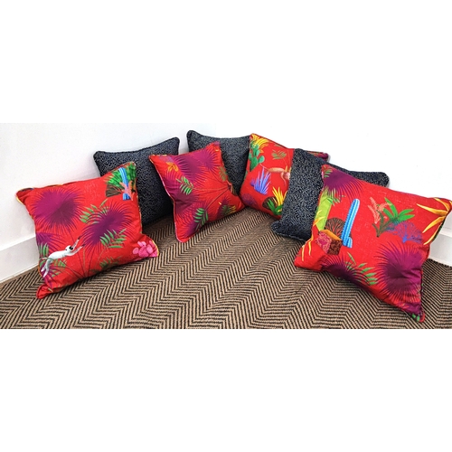 71 - CUSHIONS, seven, comprising three blue chenille and four red palm design fabric, 42cm square. (7)