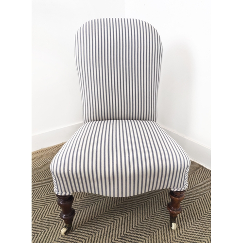 72 - SLIPPER CHAIR, Victorian walnut in blue and white ticking with ceramic castors, 81cm H x 52cm W x 56... 