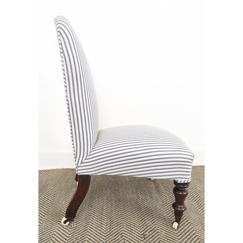 72 - SLIPPER CHAIR, Victorian walnut in blue and white ticking with ceramic castors, 81cm H x 52cm W x 56... 