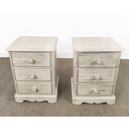 75 - BEDSIDE CHESTS, a pair, grey painted each with three drawers, 64cm H x 46cm W x 36cm D. (2)