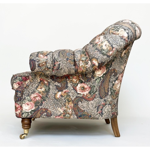 105 - ARMCHAIR, Victorian manner with Liberty style deep buttoned upholstery, with arched back and turned ... 