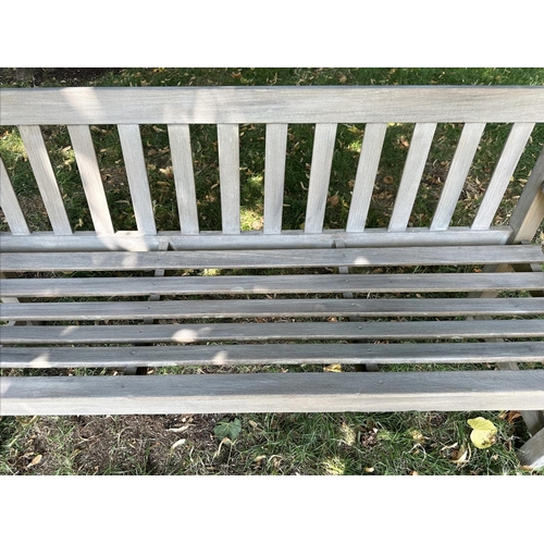 120 - GARDEN BENCH, well weathered teak, slatted and dowelled construction, 122cm W.