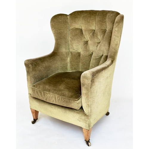 83 - WING ARMCHAIR, Edwardian moss green velvet upholstered with button back and square tapering supports... 