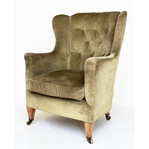 83 - WING ARMCHAIR, Edwardian moss green velvet upholstered with button back and square tapering supports... 