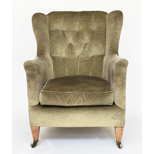 83 - WING ARMCHAIR, Edwardian moss green velvet upholstered with button back and square tapering supports... 