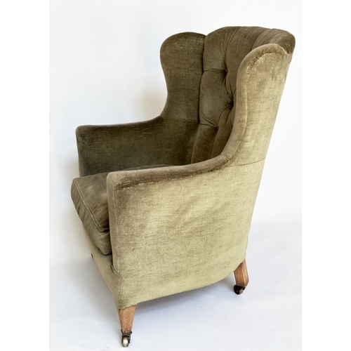 83 - WING ARMCHAIR, Edwardian moss green velvet upholstered with button back and square tapering supports... 