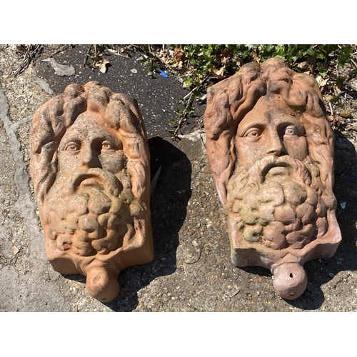 179 - TERRACOTTA FACE WALL PLANTERS, a pair, in a weathered finish, 44cm H x 26cm W x 20cm D. (2)