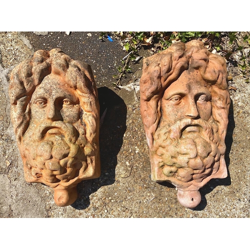 179 - TERRACOTTA FACE WALL PLANTERS, a pair, in a weathered finish, 44cm H x 26cm W x 20cm D. (2)