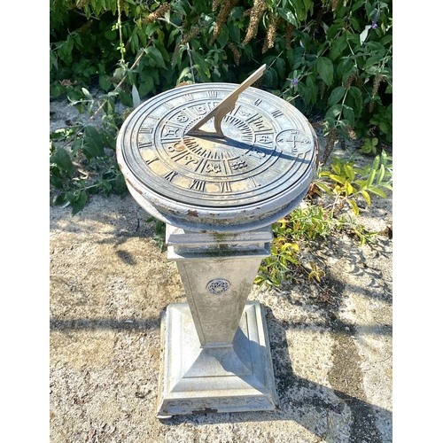 180 - SUNDIAL, early 20th century cast iron with bronze dial, 95cm H x 35cm W x 35cm D.