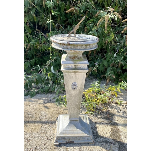 180 - SUNDIAL, early 20th century cast iron with bronze dial, 95cm H x 35cm W x 35cm D.