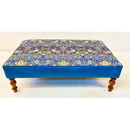 78 - FOOTSTOOL, with William Morris style upholstery on turned supports, 35cm H x 108cm W x 59cm D.