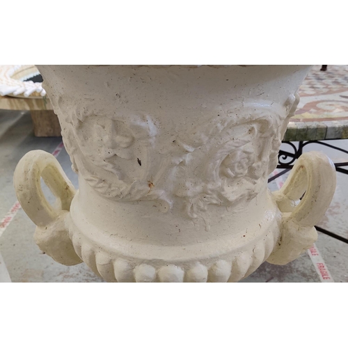 161 - GARDEN URNS, a pair, Victorian cream painted cast iron of campana form on plinths, 100cm H x 46cm D.... 