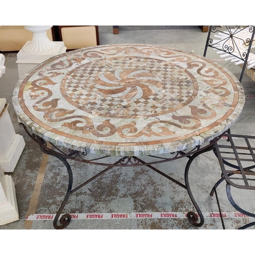 163 - GARDEN TABLE, circular stone mosaic on iron supports, 74cm H x 126cm D and a pair of folding metal c... 