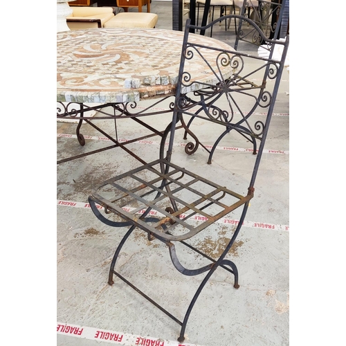 163 - GARDEN TABLE, circular stone mosaic on iron supports, 74cm H x 126cm D and a pair of folding metal c... 