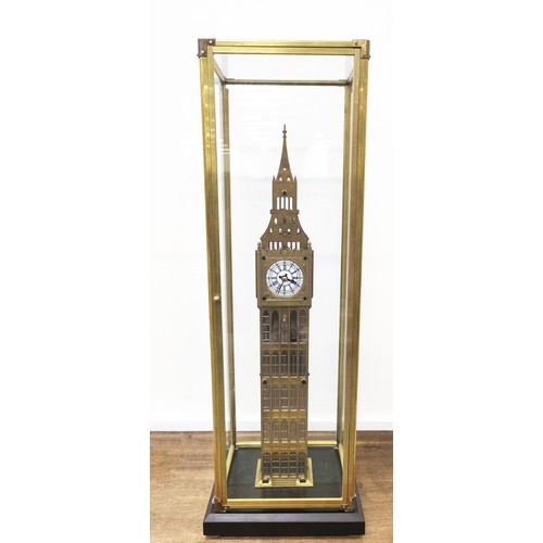 402 - ELIZABETH TOWER SKELETON CLOCK, gilt metal and glass cased, 70cm H x 21cm W x 16cm D.