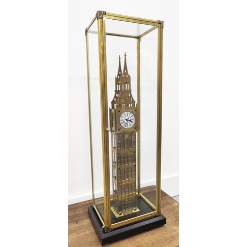 402 - ELIZABETH TOWER SKELETON CLOCK, gilt metal and glass cased, 70cm H x 21cm W x 16cm D.