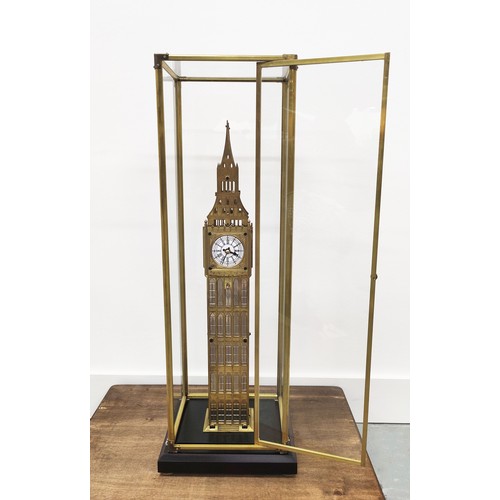 402 - ELIZABETH TOWER SKELETON CLOCK, gilt metal and glass cased, 70cm H x 21cm W x 16cm D.