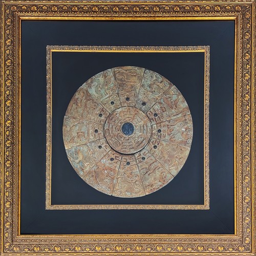 144 - CHINESE ARCHAIC STYLE ZODIAC JADE ROUNDEL, mounted in ornate gilt frame, 96cm x 96cm.