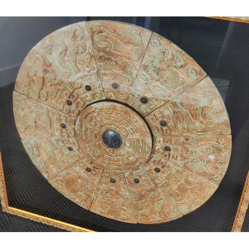 144 - CHINESE ARCHAIC STYLE ZODIAC JADE ROUNDEL, mounted in ornate gilt frame, 96cm x 96cm.