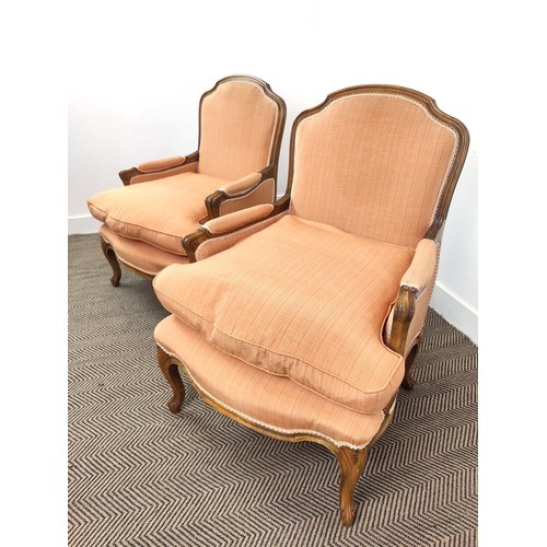 149 - CANAPE, Louis XV style beechwood in peach fabric, 98cm H x 133cm and a pair of matching bergeres, 95... 