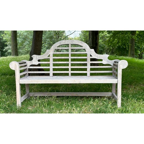 114 - 'LUTYENS' STYLE GARDEN BENCH, weathered teak slatted and dowelled construction after the design by S... 