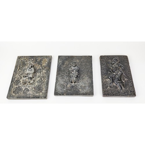 29A - CHINESE CARVED STONE RELIEFS, a set of three, largest 30cm x 23cm. (3)