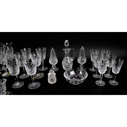 16 - WATERFORD GLASSWARE, a large collection comprising six champagne flutes, six white wine glasses, twe... 